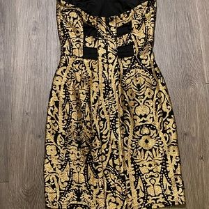 Size S- gold and black mini strapless dress